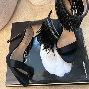 BCBGMaxazria’s Devine Beaded Fringe Leather Sandals